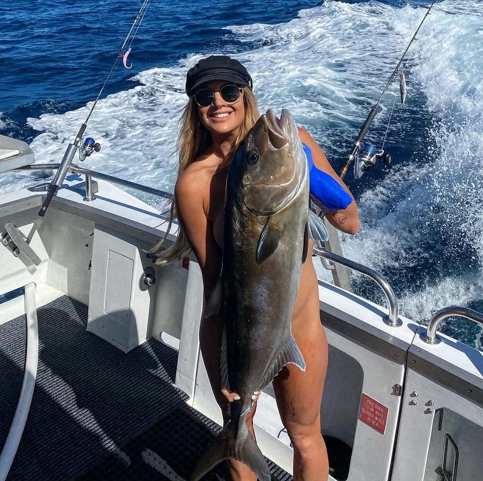 Perth topless waitress on a fishing charter in Western Australia